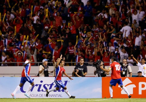 SAN JOSE, COSTA RICA - SEPTEMBER 06: Celso Borges #5 reacts after scoring the second goal against the United States with Joel Campbell #12 and Bryan Ruiz #10 during the FIFA 2014 World Cup Qualifier at Estadio Nacional on September 6, 2013 in San Jose, Costa Rica.   Kevin C. Cox/Getty Images/AFP