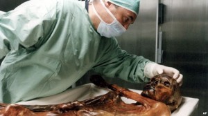 A scientist examines Oetzi the 'Iceman' in Bozen, Italy. (File)