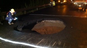 The Obama Administration is concerned that large holes in Costa Rica's roadways, such as the one pictured above, could potentially swallow the presidential limousine. 