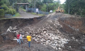 Workers had dumped some stones into the hole.  PHOTO: Timothy Williams / InsideCostaRica.com (Click to Enlarge)