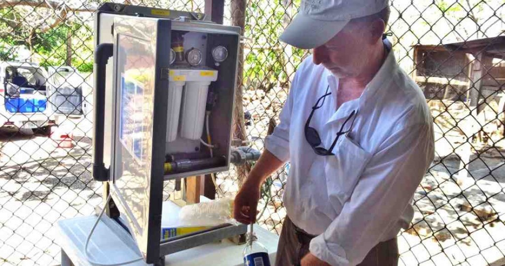 Jim Ryan, taking water samples in community Agua Caliente de Bagaces, February 2013