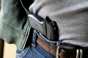 man with gun in wasteband