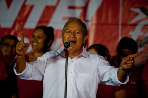 EL SALVADOR, San Salvador : Ruling leftist Farabundo Marti National Liberation Front (FMLN) candidate Salvador Sanchez Ceren delivers a speech to supporters after recieving vote results during the presidential election in San Salvador on February 2, 2014. Ceren narrowly missed victory in El Salvador's presidency race on February 2, and will now face a run-off vote with a conservative rival, according to official results. AFP PHOTO/ Jose CABEZAS