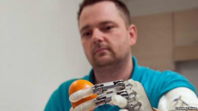 Amputee Dennis Aabo Sørensen wearing sensory feedback enabled prosthetic in Rome, March 2013. (Lifehand 2 / Patrizia Tocci)