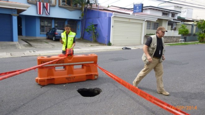 While very deep, the hole is currently only a couple of feet across, though authorities are concerned that the hole could widen significantly. (Photo courtesy of CRHoy.com / Pinterest)