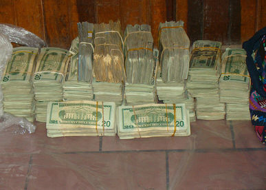 Police discovered $225,00 in cash in a suitcase, mostly in $20 bills. (Photo courtesy of the MSP)