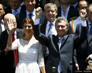 Argentina's President Mauricio Macrii (R) and his wife Juliana Awada wave at the crowd after being sworn-in as president in Buenos Aires, Argentina, December 10, 2015. REUTERS/Enrique Marcarian